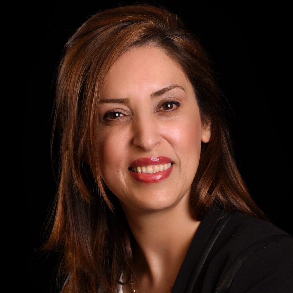 photo of Dr. Mitra smiling